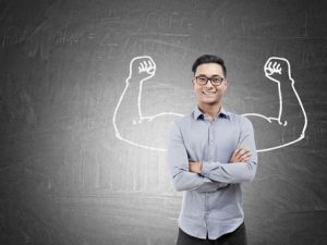 Man standing with illustration of raised hands behind him